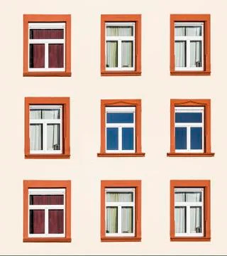 Facade of house with four windows Stock Photos