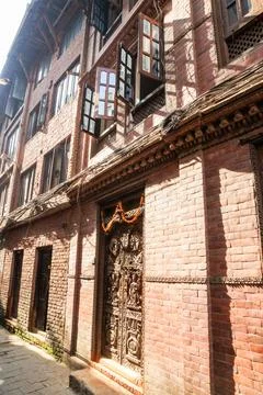 The facade of a house with open windows. Stock Photos