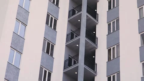 Facade of houses. Pan down Stock Footage 155960911