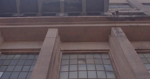 Facade an industrial building windows, rectangles and glass window frames. Stock Footage 188958577