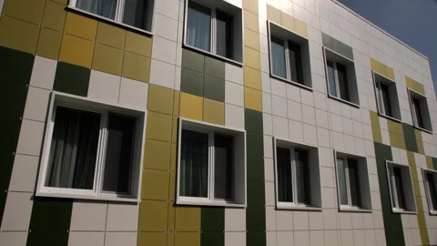 Facade of kindergarten building decorated with colored tiles 動画素材 280914927