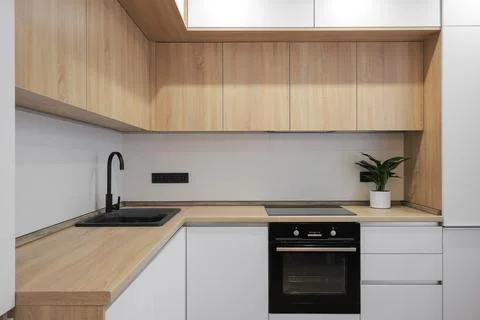 Facade of kitchen furniture in the kitchen Stock Photos