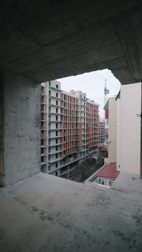 Facade of a large new building under construction. Vídeos de archivo 327937826