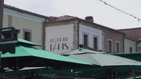 Facade of Le Petit Paris hotel and restaurant in the Old Bazaar of Korçë Stock Footage 342844463