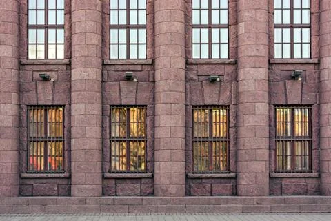 Facade made of red granite. Stock Photos