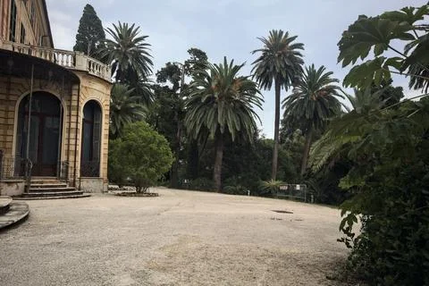 Facade of a mansion in a park Stock Photos
