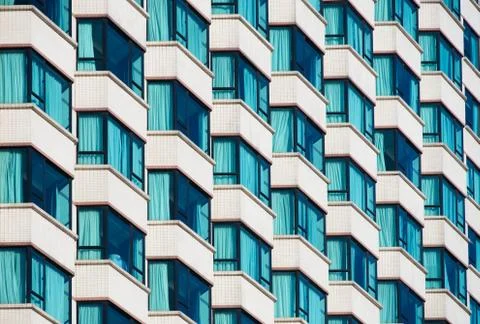 Facade with many bay windows Stock Photos