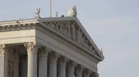 Facade with marble statues and columns of Austrian Parliament Building, Vienna Stock Footage 59571716