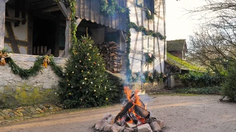 Facade of medieval half-timbered house decorated with bonfire Stock Footage 124474956
