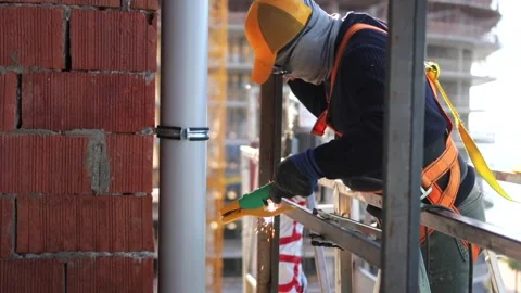 Facade Metal Structure Welding at Height. Stock Footage 259394660