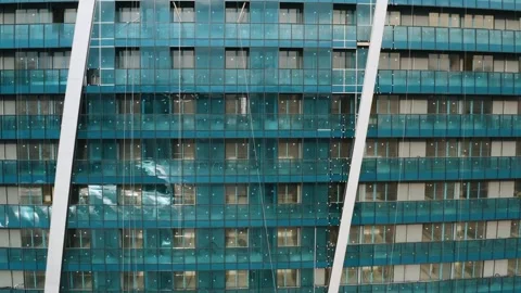 Facade of moderm multi storey glass building. Architecture abstract background Stock Footage 269056843
