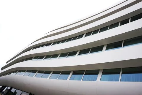 Facade of a modern building of rounded shape in Wroclaw Fotos de archivo