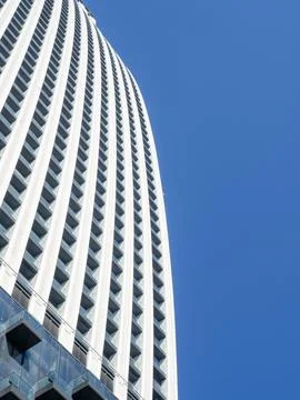 Facade of a modern multi-storey building. Balconies of a high-rise building.. Stock Photos