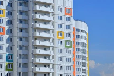 Facade of a multi-storey building. Fragment Stock Photos