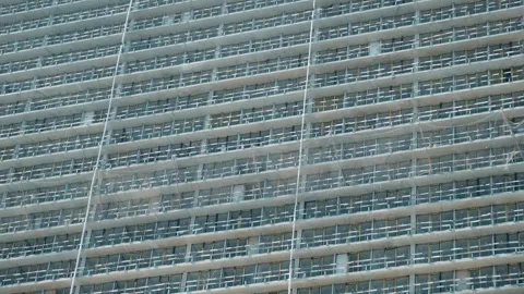 Facade of multi storey building under construction. Architecture abstract Stock Footage 253284035