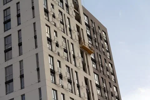 Facade of a multi-storey building under construction Stock Photos