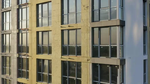 Facade of a multi-storey cast-in-place concrete residential apartment building Stock Footage 157341100
