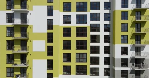 The facade of a multi-storey modern residential building Stock Footage 239449816