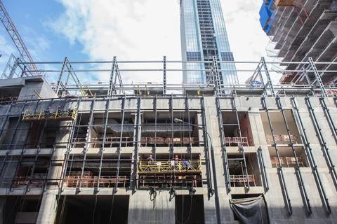 Facade of a multi-storey office building under construction Stock Photos