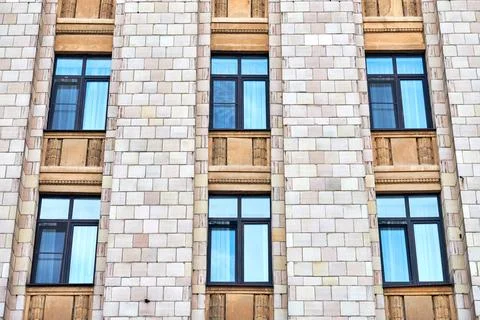 Facade of multistorey building Stock Photos
