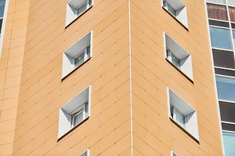 Facade of multistorey building Stock Photos