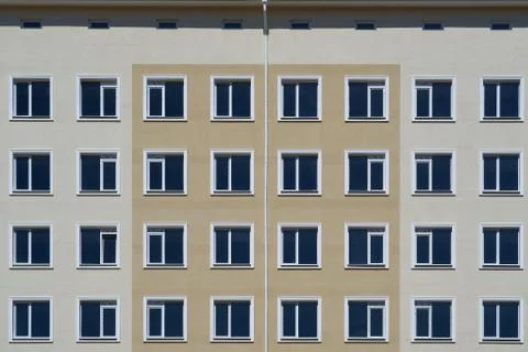 Facade of a new multi-storey building with many windows Stock Photos