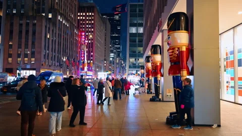 Facade of New York building decorated with large figures of nutcracker soldiers. Stock Footage 323308752