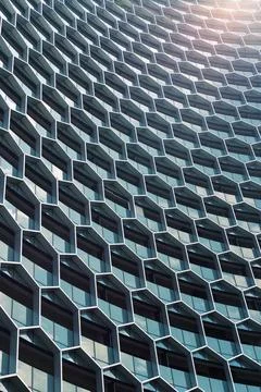 Facade of the office building was designed in beehive. Stock Photos