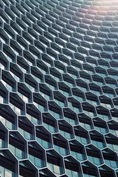 Facade of the office building was designed in beehive. Stock Photos