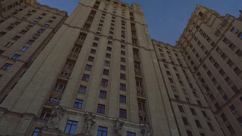 The facade of an old building with beautiful architecture. Stalin skyscraper. 4K Stock Footage 106017414