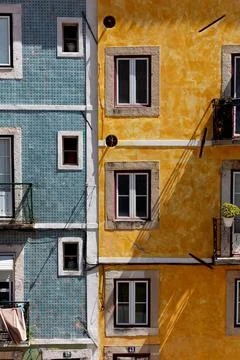 Facade of an old building with windows and balconies in Alfama district, Lisbon Foto stock