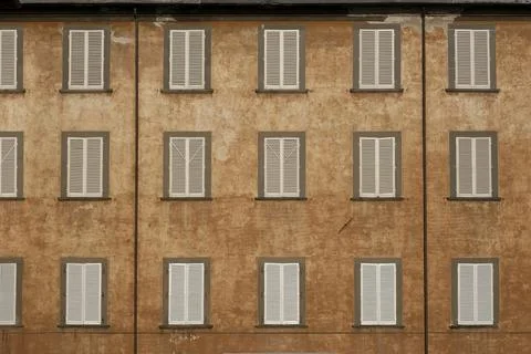Facade of a Old Building with Windows in a Medieval Town of Tuscany Stock Photos