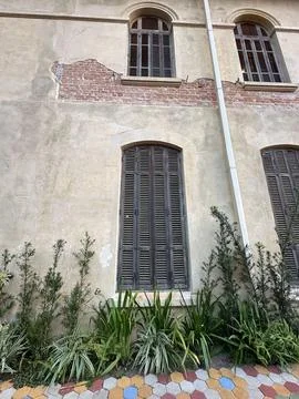 Facade of an Old Building with Windows Stock Photos