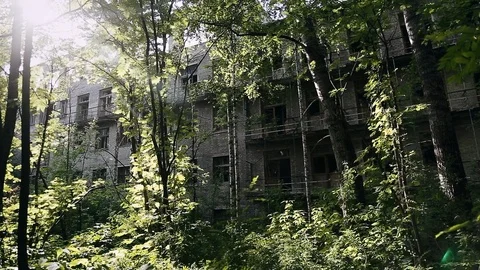 Facade old destroyed brick building with broken windows in industrial zone of Stock Footage 110438347
