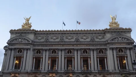 Facade of the Old Garnier Opera House In Paris with the flags of Europe and Stock Footage 93415898