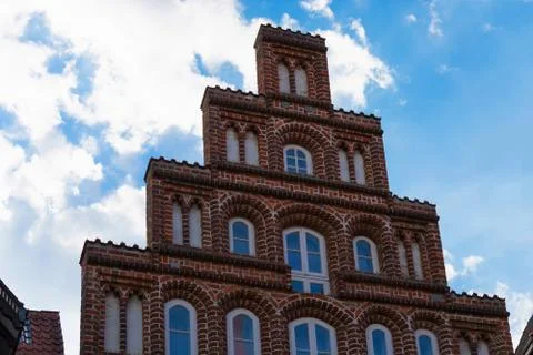 Facade of an old house with stepped gable Stock Photos