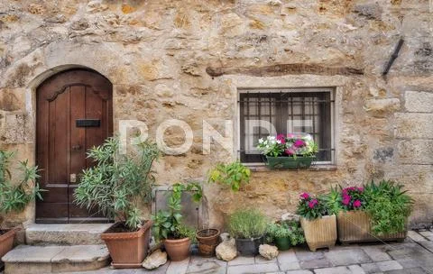 Facade of the old house in village France Stock Photos