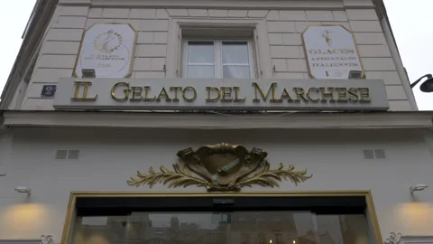 Facade, old important ice cream shop. Center of Paris. Ice cream shop. Tilt 4K Stock Footage 237261471