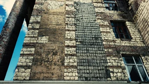 The facade of an old multi-storey building without cladding Stock Footage 108837959