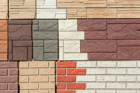 Facade panels with texture of stone wall for exterior and interior decoration Stock Photos