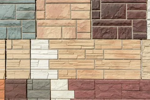 Facade panels with texture of stone wall for exterior decoration of various c Stock Photos