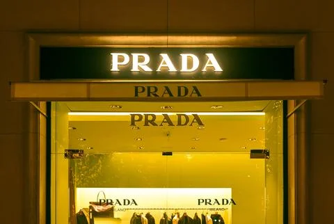 Facade of Prada store with logotype and showcase in Paris Stock Photos