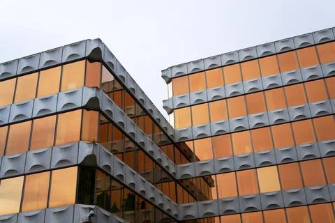 Facade of prefabricated modular concrete on functionalist office for Genera.. Stock Photos