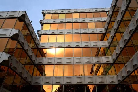 Facade of prefabricated modular concrete on functionalist office for Genera.. Stock Photos