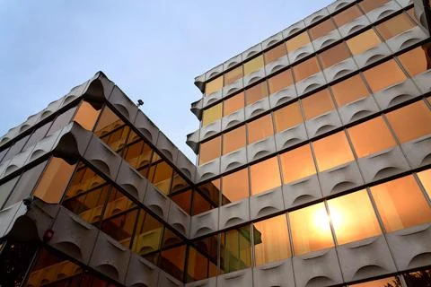 Facade of prefabricated modular concrete on functionalist office for Genera.. Stock Photos