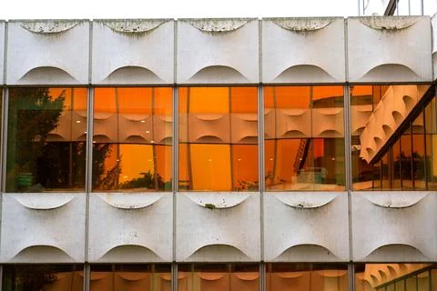 Facade of prefabricated modular concrete on functionalist office for Genera.. Stock Photos