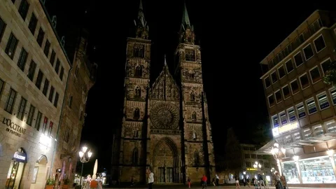 Facade of the Saint Lorenz Kirche, at night, in Nurnberg Stock Footage 117591473