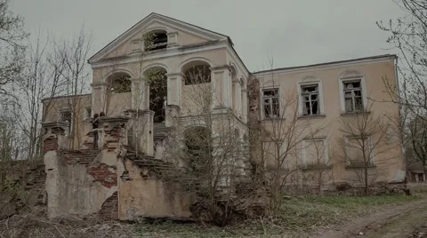 Facade with the staircase of the old dilapidated estates of t Stock Footage 63321597