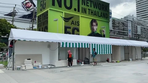 Facade store front under construction with advertisement billboard, bangkok Video stock 250087022