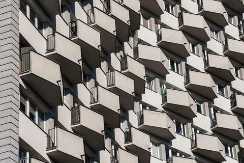 The facade with triangular balconies. Stock Photos